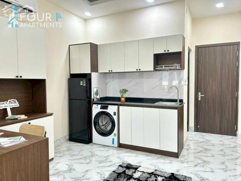 Căn hộ ban công full nội thất, máy giặt riêng, bếp rộng xa giường gần vòng xoay Hàng Xanh