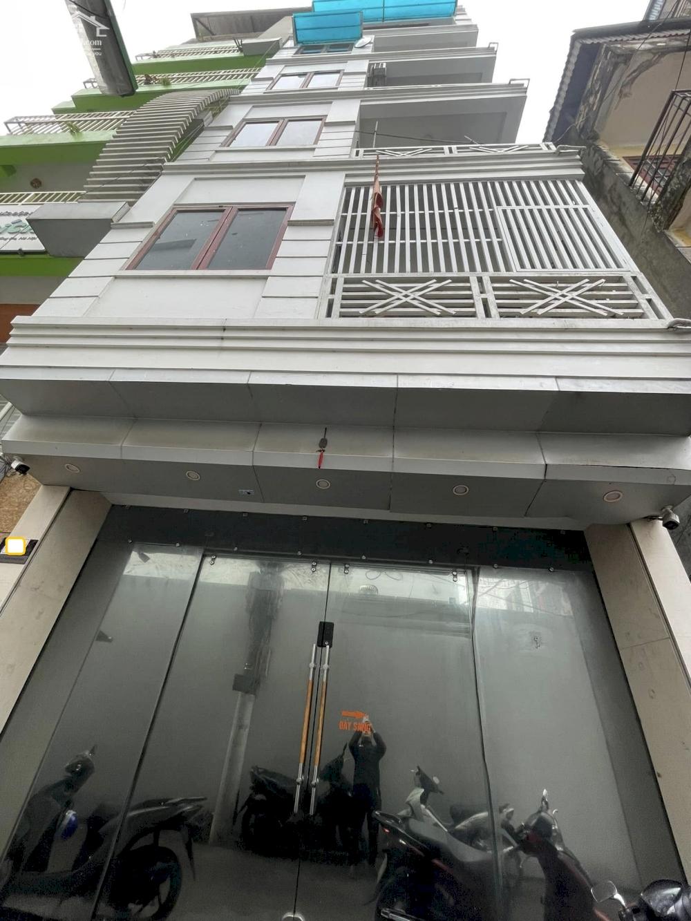 Bán nhà lô góc phố Tam Khương, Đống Đa, ô tô đỗ cửa CCMN 7 tầng 99m2 giá 31 tỷ
