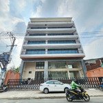 tòa nhà mới 100% mt nguyễn trọng tuyển ngang 15m dtsd 1000m2 hầm-7 tầng -thang máy-pccc , sàn suốt.