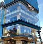 siêu vị trí, tòa nhà 7 tầng góc vòng xoay 3 mặt tiền châu văn liêm ngang 10m, hđt 250tr/th giá 62tỷ