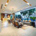 Toà hotel 130m2 tân mai - dòng tiền 300tr/tháng - mặt phố oto tránh