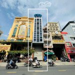 Bán tòa nhà mặt tiền 18 phổ quang, phường 2, quận tân bình. dt: 4,5 x 30m. hầm + 10 tầng