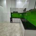 Bán nhà mới xây dựng bùi đình túy p12 ngay chợ long văn tự, giao thông thuận tiện