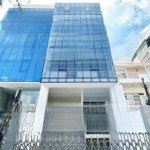 Tòa nhà mt phổ quang khu sân bay 8x25m hầm 4 lầu cho thuê