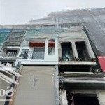 Tòa nhà văn phòng mới xây 6 tầng thang máy - mặt phố tân mai, đường trục chính vành đai 2.5