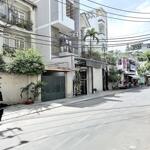 Mặt tiền kinh doanh - building 6 tầng - 6,5m x 20m - hầm + thang máy - sân bay 3p