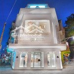 Tòa nhà góc 2mt lê thánh tôn, quận 1. dt: 8x20m. trệt 4 lầu thang máy