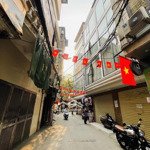 Bán Nhà Ngõ Lương Sử C 6 Tầng Mặt Tiền 6,9M Ngõ Ô Tô Tránh Doanh Thu 90 Triệu/Tháng/16 Phòng