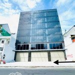 Bán tòa nhà ngay mặt tiền nơ trang long - dt: 11x47m hầm 6 tầng, hđt: 450 triệu/tháng giá: 55 tỷ tl