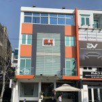 Tòa nhà đường phổ quang 10x20m hầm trệt 4 lầu cho thuê
