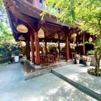 Cho thuê quán cafe nhà sàn gỗ sang trọng mặt tiền khu Mỹ An, gần Cầu Trần Thị Lý và Sông Hàn, Quận Ngũ Hành Sơn.