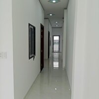 Nhà mới xây 2 lầu 1 trệt 1 tum đường nhựa 8m 4.7 tỷ/93m2