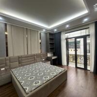 bán nhà phố Trần Đăng Ninh- Giáp quận Ủy, 50m2  kinh doanh thang máy nhà mới tinh ở ngay