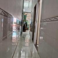 Bán Nhà Mặt Tiền Tân Hiệp 11. 105m2,  ngang đẹp 5m, Đường 10, Kinh Doanh tốt,xe hơi ngủ trong nhà.