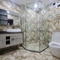 Nhà VIP cách 1 nhà ra phố Nguyễn Khang 7 tầng 56m2 thang máy, ô tô đỗ cửa, cho thuê, kinh doanh tốt