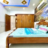 Nhà sang trọng 1 trệt 2 lầu sân thượng đường 6m thông tân chánh hiệp
