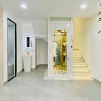 Bán nhà Đẹp Lạc Long Quân - 56m2 x 7T Thang máy Gara Oto - Vài bước ra phố - hướng TN