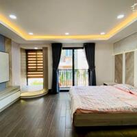 Bán nhà Đẹp Lạc Long Quân - 56m2 x 7T Thang máy Gara Oto - Vài bước ra phố - hướng TN