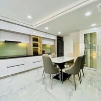Bán nhà Đẹp Lạc Long Quân - 56m2 x 7T Thang máy Gara Oto - Vài bước ra phố - hướng TN