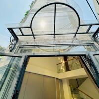 Bán nhà Mới 100% 6 tầng HXH gần Ni Sư Huỳnh Liên, DT 60m2 - giá 9.4 tỷ TL