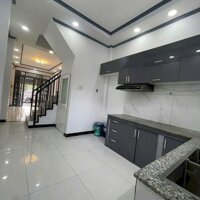 Nhà 2 lầu mặt tiền Mạc Thiên Tích
