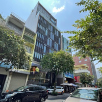 Tòa Building Mới 100% Ngay Trần Hưng Đạo Q1.Diện Tích: 12 X 30 . Hầm 9 Tầng . Hđt : 750 Triệu/Tháng
