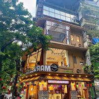 Cho Thuê Mặt Bằng Lô Góc Mặt Tiền 9M Diện Tích 100M2 Mặt Phố Nguyên Hồng - Đống Đa, Nhận Diện Tốt