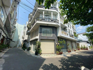 nhà 4.65m nở hậu 5.5m dài 18m đúc 4 tầng hẻm xe hơi 6m p15 tân bình