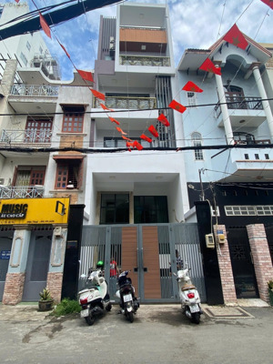 5.3m x 20m - 6 tầng - tòa nhà cách mạng tháng tám quận 3 - thang máy - nhà mới ô tô đậu thoải mái