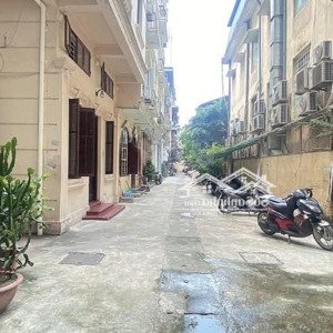 bán nhà trần hưng đạo 70m2 5 tầng ô tô vào nhà lô góc 3 thoáng 27.5 tỷ