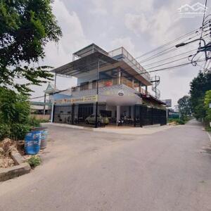 Lô góc 2 mặt tiền Dt 265m thổ cư 120m (15 x 17) sẵn nhà 1 trệt 1 lầu sân thượng Tân Định Bến Cát BD giá 5,6 tỷ
