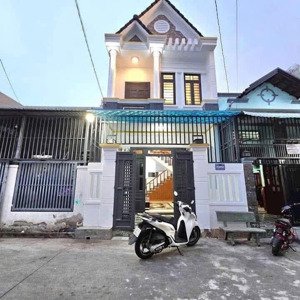 nhà 1 trệt 1 lầu 65m . đường 6m . kdc an ninh tốt . gần chợ tân long