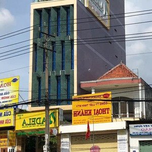 bán nhà mặt tiền kinh doanh có sẵn thu nhập 45triệu / tháng , vị trí đẹp đối diện siêu thị go