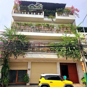nhà mặt tiền nguyễn thái học dt 98m2 ngang 12m 1 trệt 3 lầu đường nhựa lớn gần chợ dĩ an 