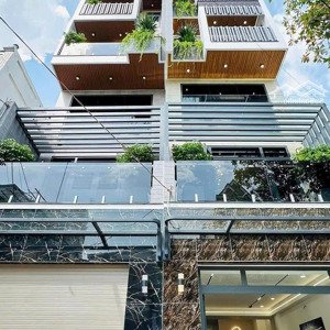 nhà 5 lầu, mặt tiền đường số 12, có thang máy, gần công viên làng hoa