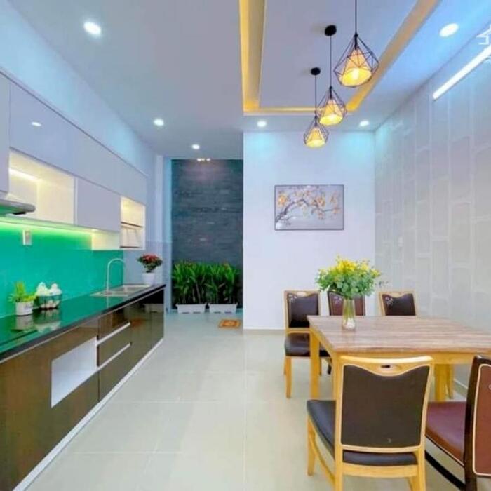 Hình ảnh Bán gấp nhà Đình Phong Phú , 81 m2 ,4 tầng , 7 phòng , dòng tiền, gần MT, PL chuẩn 1