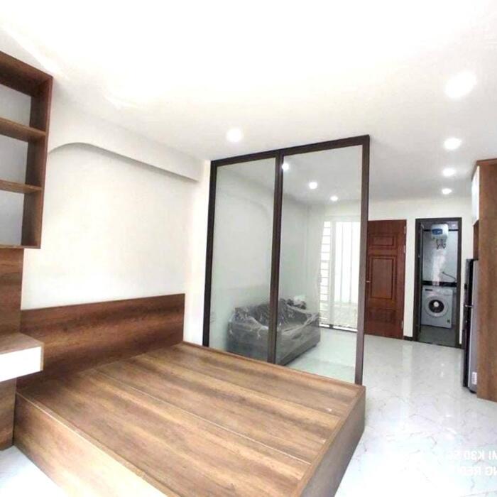 Hình ảnh Bán tòa nhà 7 tầng CHDV Tây Sơn, 75m2, Ô tô qua nhà 4