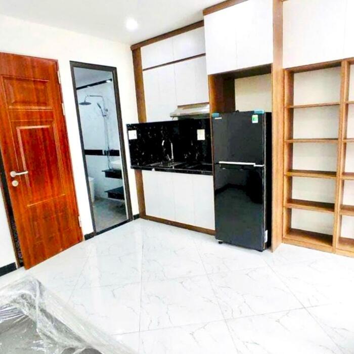 Hình ảnh Bán tòa nhà 7 tầng CHDV Tây Sơn, 75m2, Ô tô qua nhà 2