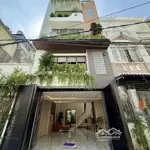 Nhà ngay ngã tư ga, sát bên chợ cầu đồng, dt:5,2x10m, lửng, 3lầu, 4pn, gara ô tô, sân thượng.