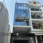 Nhà đường hoàng hoa thám, tân bình.dt 5x20m, hầm 5 lầu, nhà mới xây có thang máy,mặt kính sang